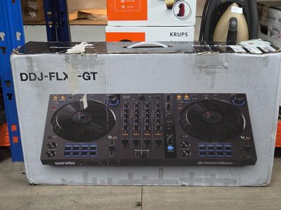 a box that has a dj controller inside of it
