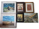 many paintings on the wall of this room