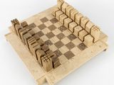 une image représentant un échiquier en bois sur lequel figure une ville