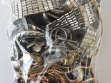 a bag of assorted metal items on a table
