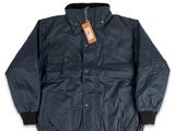 an image of a blue jacket with a tag on it