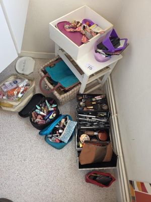 a picture of a room with a lot of clutter on the floor