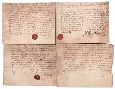 trois vieux morceaux de papier portant un cachet de cire