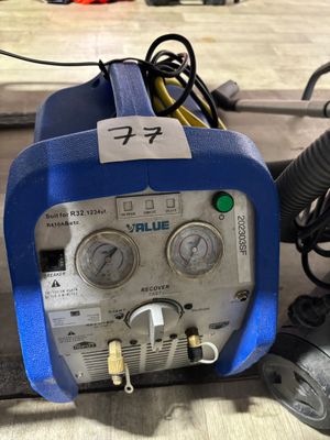a blue and white machine that is sitting on a table