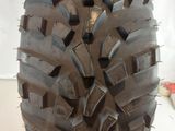 a large tire that is on display on the table