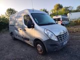 the silver van is parked in a lot with other vehicles in the background