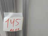 a sign on the door of a building that says it ' s 11 15