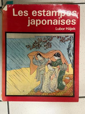 a red book cover with a picture of a woman in a kimono