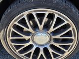 the tire of a car with a flat tire on the road