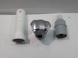 two different types of faucets sitting on a white surface