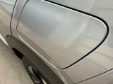 a close up of a car door handle and a car door handle