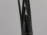 a picture of a pipe with a bunch of pencils in it