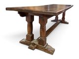 an image of a wooden table with two legs and a wooden table top