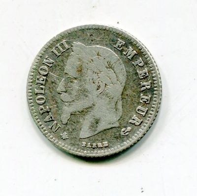 an old coin with a man ' s head on it