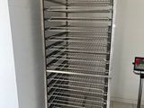 an image of a commercial food drying rack in a kitchen