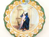 a plate with a picture of a man and a woman on it