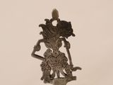 pair of antique brass figurines of a woman and a man