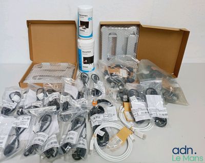 an image of a box of assorted electronics and cables