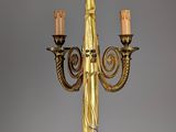 an image of a gold colored chandelier hanging from a ceiling