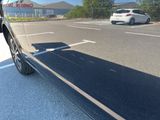 a car that is parked on the side of the road