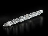 an art deco diamond and platinum - plated bangle