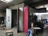 a room that has a pink door in it