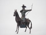 une statue représentant un homme à cheval, muni d'un arc et de flèches