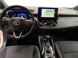 the interior of a car with a steering wheel, dashboard, and dashboard lights