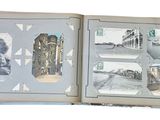 an open book with pictures of people and buildings on it