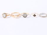 a set of five rings with different shapes and sizes