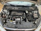 the engine of a car with its hood open and the hood open