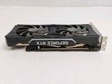 a close up of a video card on a white surface
