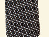 a close up of a tie on a white background