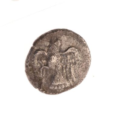 une vieille pièce de monnaie sur laquelle figure un ange
