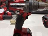 a cordless drill that is sitting on a table