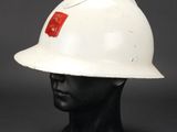 a white hard hat on a mannequin head