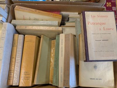 a box full of books sitting on a table