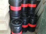 many black and red kegs stacked on top of each other
