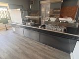 an image of a kitchen with a lot of counter space