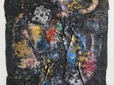 une image représentant un morceau de papier noir sur lequel figure une peinture