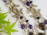 an image of a close up of a necklace on a table