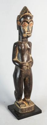 an image of a statue of a man with a hat on his head