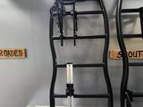 two chairs that are next to each other on a shelf