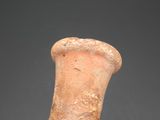 an image of a clay vase on a black background