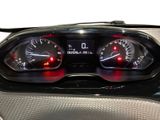 a close up of a car dashboard with a speedometer