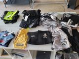 a table with many different items on it in the room