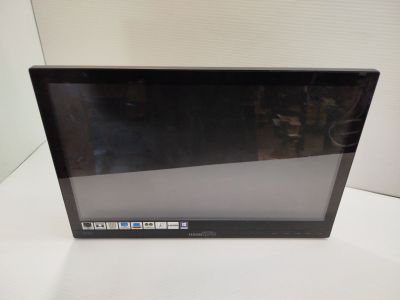 a black laptop computer sitting on a white table