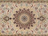 un ancien tapis persan à motif de médaillon