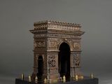 statue of the arc de trio triumph in bronze on a black marble base