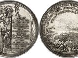 a silver coin with a picture of a man holding a sword